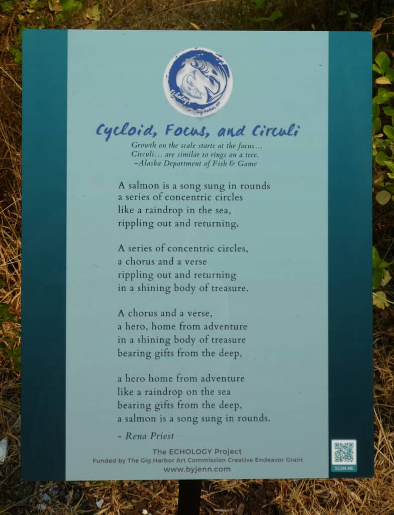 A poem by Washington State poet laureate Rene Priest is staked along a path in Gig Harbor