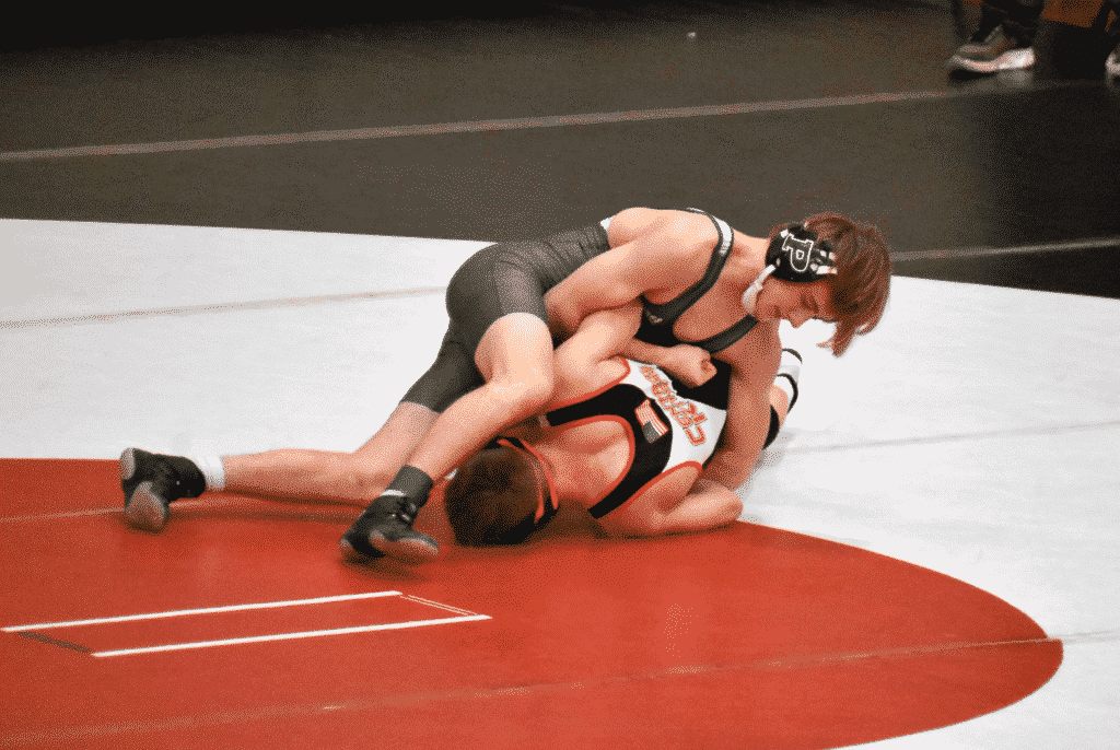 Peninsula's Aiden Eversull arm bars his opponent to his back. Eversull placed fourth at 120 pounds.