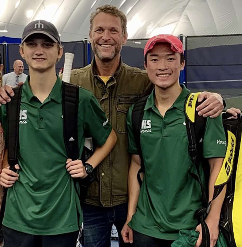 The Peninsula High doubles team of Zach Lipsey and Ethan Sun with coach Ian Skidmore. Photo courtesy of PHS