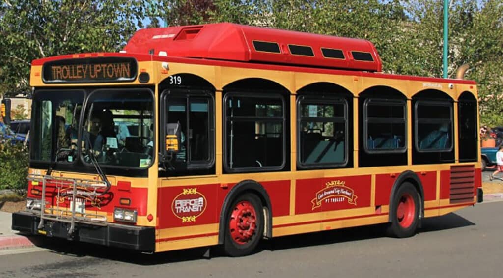 A 30-foot bus wrapped to look like a trolley car will run through Gig Harbor starting in July.