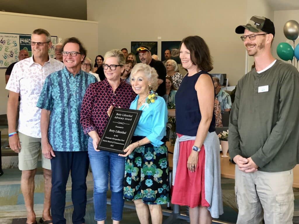 Betty Lilienthal poses with her advocacy award plaque and board members, from left, Steve Nixon, Kurt Grimmer, Missy Hill, ???? and Billy Sehmel.