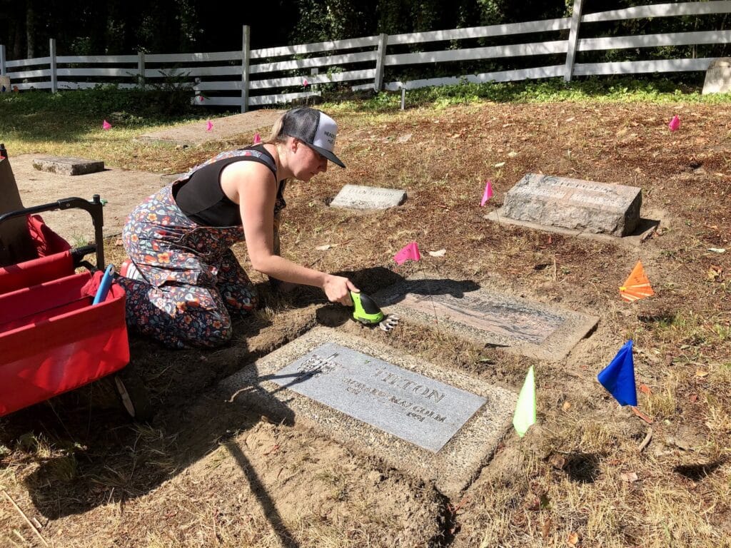 Caleh Chumley trims around a marker.