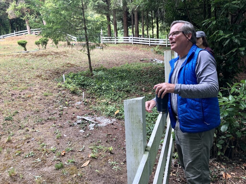 Project manager Bruce Morse observes the canine search Thursday.