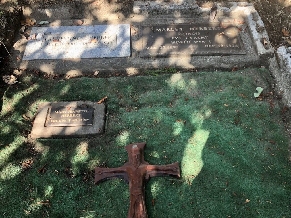 The grave tenders scraped away the debris Saturday to discover Mary Herbert's marker.