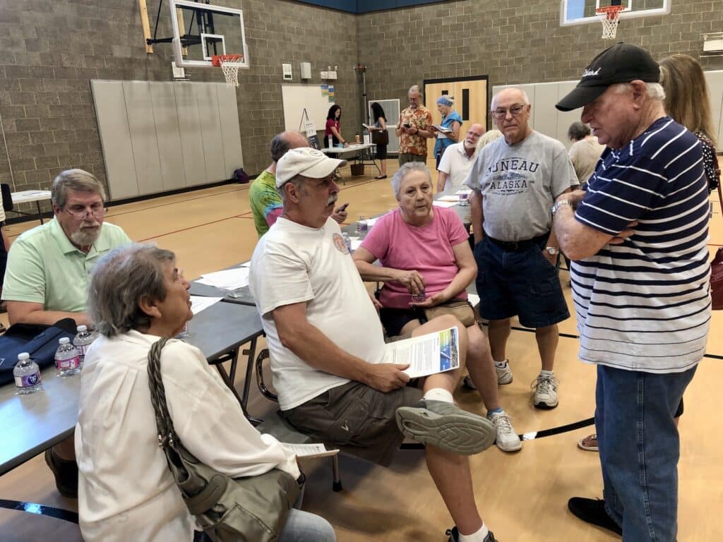 A group of Fox Island residents discuss bridge replacement during an open house Thursday.